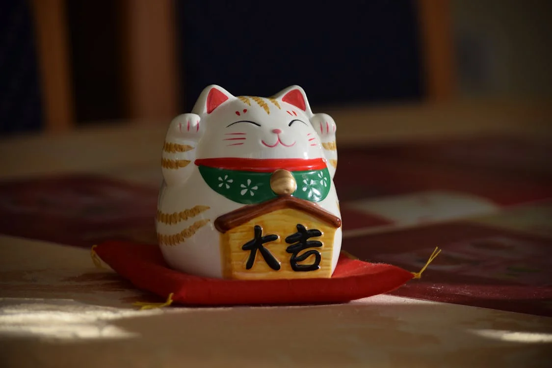You are currently viewing Les Maneki-Neko et leurs symboliques